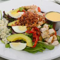 Rioja Cobb Salad · Smoked bacon, grilled chicken, hard boiled egg, bleu cheese, avocado, roasted red pepper on ...