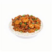 Mongolian Chicken · Crispy chicken, tossed in a sweet and spicy Mongolian sauce. Topped with scallions.