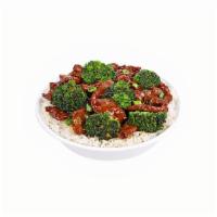 Beef & Broccoli · Thick beef, sauteed in garlic soy sauce with carrots and broccoli.