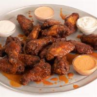 20 Wings · 20 chicken wings tossed in our secret spices. Choose Mild, Medium, Hot or Nashville Hot AF w...
