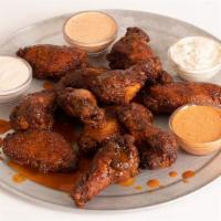 10 Wings · 10 chicken wings tossed in our secret spices. Choose Mild, Medium, Hot or Nashville Hot AF w...