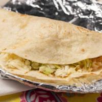 Soft Taco · Flour soft tortilla with your choice of meat, come with fresh lettuce and shredded cheese.