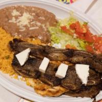 El Parian · Chicken, ribs, carne asada (steak) grilled to perfection. Served with rice, beans , lettuce ...