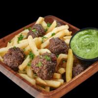 Bolipapa · Homemade meatballs over a bed of fries. Served with a side of our guasacaca (avocado/cilantr...
