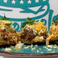 Patacon Trio · Patacon sampler with pulled pork (pernil), chicken (pollo mechado) and shredded meat (carne ...