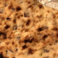 Keema Naan · Unleavened white flour bread stuffed with mildly spiced minced meat