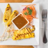 Chicken Satay (4) · Skewered chicken marinated in coconut milk and herbs. Grilled and served with homemade peanu...