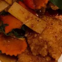 Spicy Catfish · Spicy. Deep-fried fish fillet with bamboo shoots, bell peppers, carrots, basil leaves in spi...