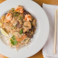 Pad Thai · Stir-fried thin rice noodles with meats, bean sprouts, green onions, and egg in homemade pad...