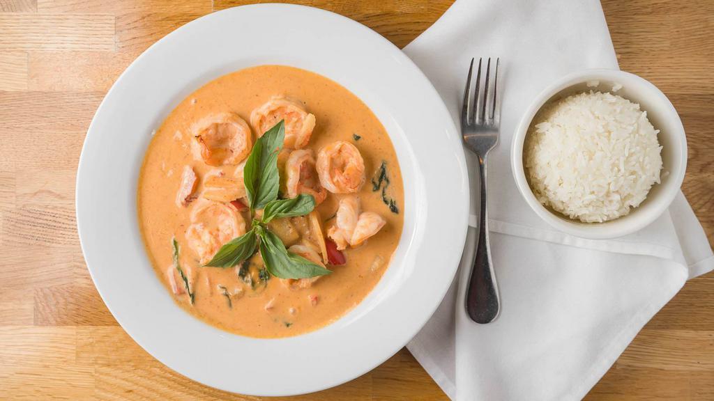 Red Curry · Mild. Curry made with red curry paste, coconut milk, bell pepper, bamboo shoots, and fresh basil.