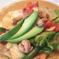 Massaman Curry · Mild. Curry made with massaman curry paste, coconut milk, potatoes, onions, and topped with ...