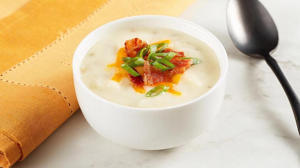Country Potato Soup · There’s nothing like the down home taste of a hot potato soup, especially if it combines the flavors of potato, onion, bacon, chives and cheese.