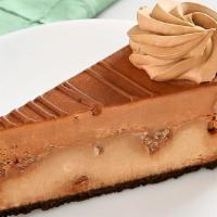 Godiva Double Chocolate Cheesecake · Rich Godiva® cheesecake baked with chunks of milk chocolate topped with chocolate mousse, ch...