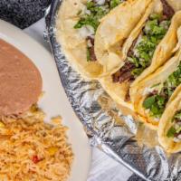 Street Tacos · Four tacos on corn tortilla with your choice of steak, chicken, chorizo, carnitas, or pastor...