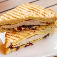 The Carter Sandwich · Smoked turkey, gouda cheese, dried cranberries, and pesto aioli on sourdough.