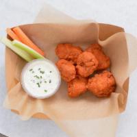 6 Crispy Boneless Wings · 6 crispy, boneless chicken wings fried to perfection. Served with celery and carrots sticks ...