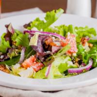 House Salad · Tomatoes, candied pecans, bleu cheese, red onion, spring mix, white balsamic vinaigrette.