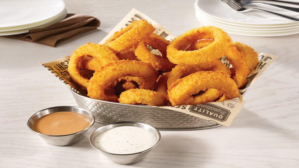 Gourmet Onion Rings · Jumbo sweet Spanish onions, thick-cut & lightly breaded in a gourmet crumb & fried until crispy. Served with our house-made chipotle sauce & ranch dressing.  1530 cal