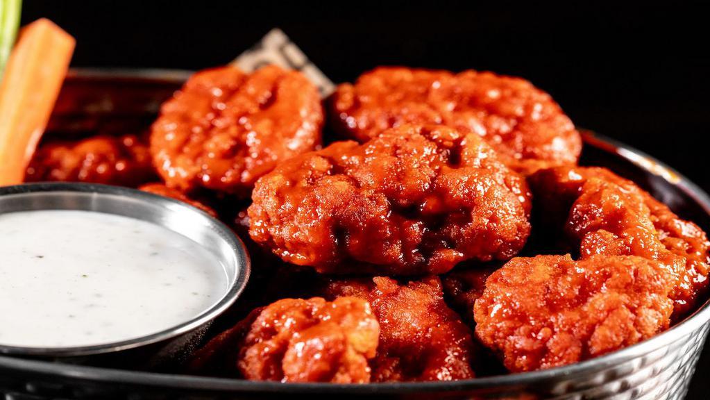 Boneless Wings · Boneless wings tossed with your choice of sauce.  Served with carrots,  celery and choice of ranch or blue cheese dressing.  1190-1730 cal