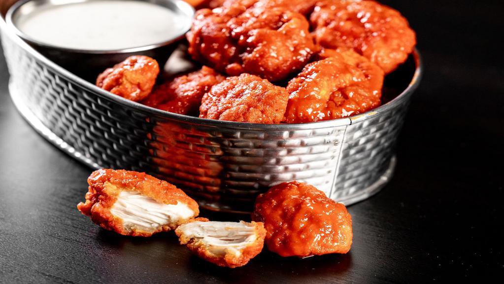 Boneless Wings Feast · A triple order of our boneless wings tossed with your choice of 3 sauces.  Served with carrots,  celery and choice of ranch or blue cheese dressing. 3570-5190 cal