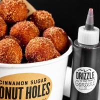 Donut Holes · Warm, cinnamon sugar donut holes served with chocolate sauce.  1760 cal