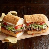 Steak Po'Boy (670 Cal) · Sirloin steak cooked medium, with spicy piquillo pepper relish, provolone, shredded lettuce,...