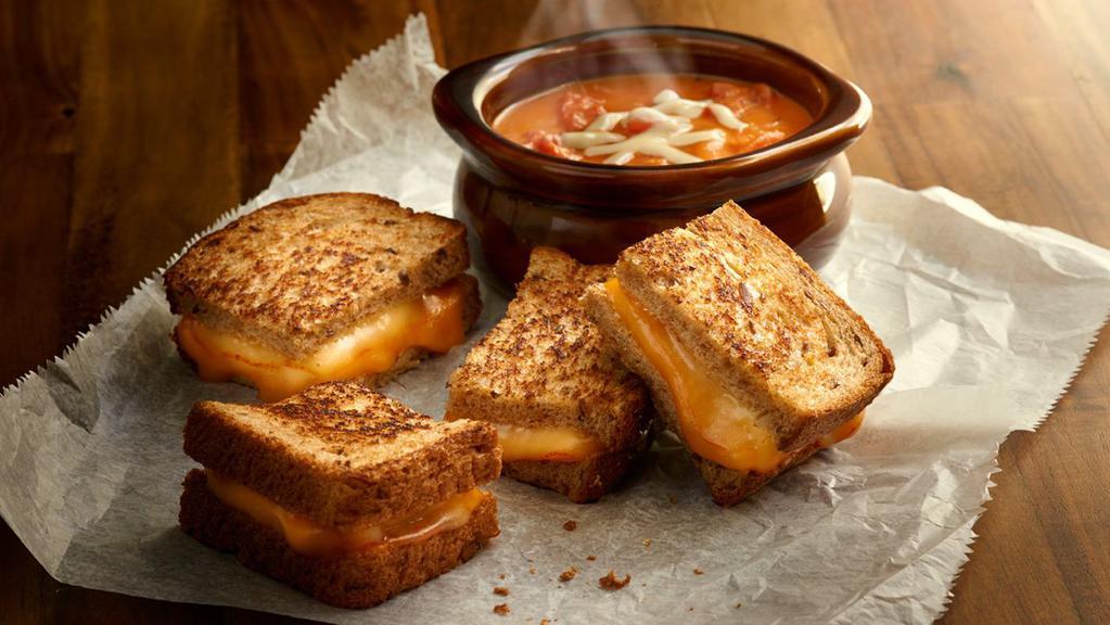 Grilled Cheese & Tomato Soup Combo · It's Back! Grilled Muenster and cheddar cheese sandwich on multigrain wheat. Served with a bowl of Tomato Basil soup.