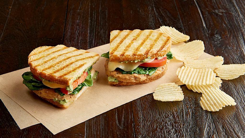 Chicken Panini (Manager'S Special) · A half sandwich served with your choice of a cup of soup, fresh fruit or Mac & Cheese. Grilled, 100% antibiotic-free chicken breast, provolone, pesto aioli, Roma tomatoes, organic spinach, on sourdough bread.