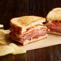 Carmela · Ham,Salami, and Pepperoni on toasted sourdough with melted provolone cheese mayo and a spicy...