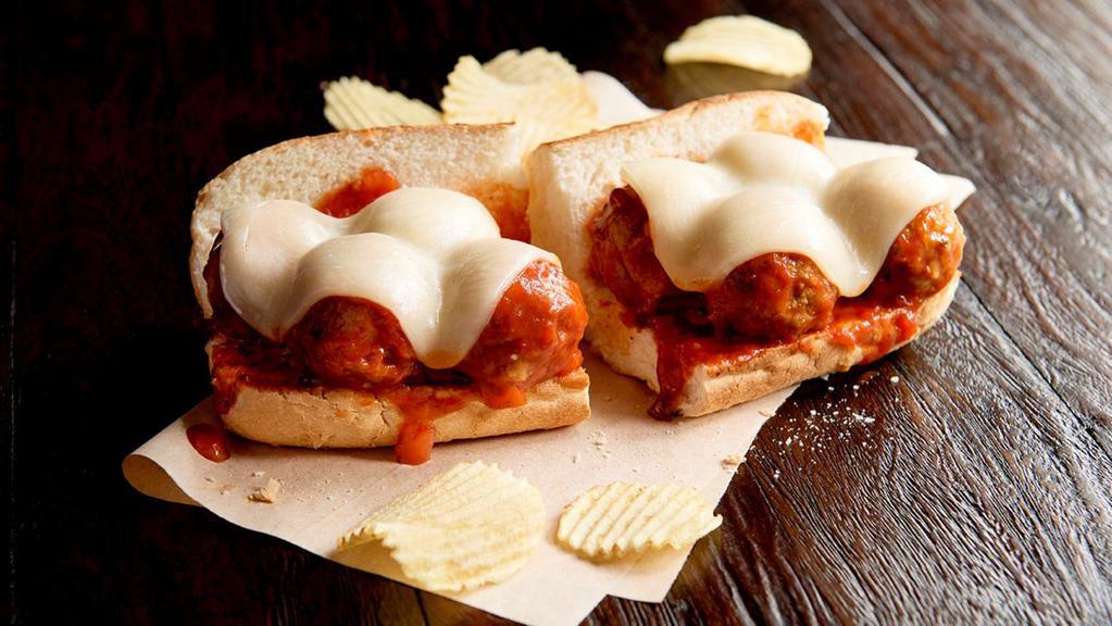 Meataballa Sandwich Regular · Meatballs, marinara, provolone, toasted on New Orleans French bread. Served with chips or baked chips (150/100 cal) and a pickle (5 cal).