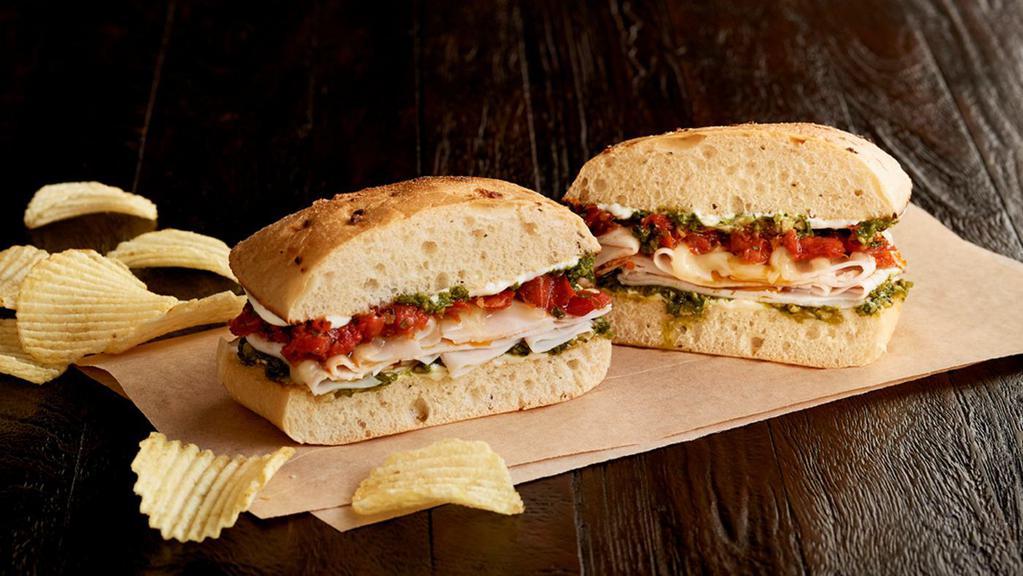 The Papa Joe (530 Cal) · Dedicated to our Founder’s Dad. Roasted turkey breast, Asiago, roasted
tomatoes, fresh basil pesto, mayo, toasted on herb focaccia bread