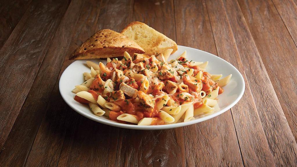 Chicken Pasta Primo · 1010/610 cal (bread: 230/120 cal) Penne pasta topped with grilled 100% antibiotic free chicken breast, tomato-basil sauce, Asiago. Served with toasted herb focaccia bread.