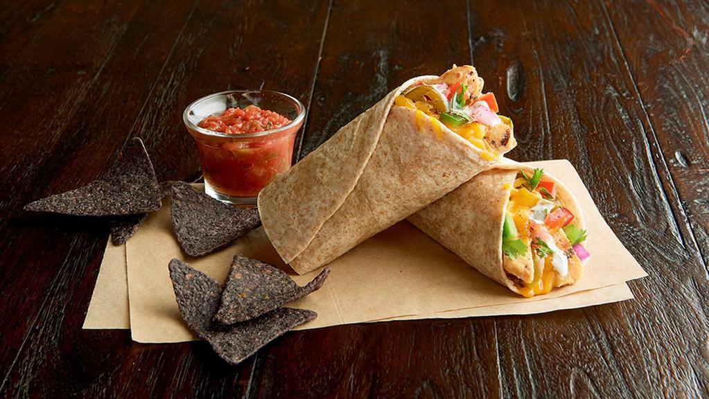 Ranchero Wrap Regular · Grilled, 100% antibiotic-free chicken breast, cheddar, jalapeños, pico de gallo, Southwest spices, ranch dressing, toasted in an organic wheat wrap. Served with blue corn chips and salsa.
