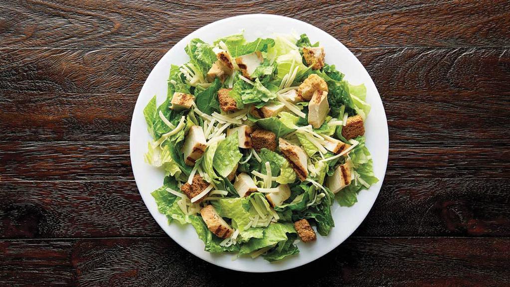 Chicken Caesar - Original · Grilled, 100% antibiotic-free chicken breast, romaine, Asiago, croutons, served with Caesar dressing and toasted herb focaccia bread.