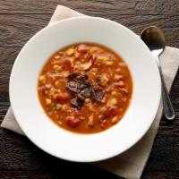 Cup Fire Roasted Tortilla Soup · Combining chunks of tender chicken with a homemade tortilla masa, real stewed tomatoes, swee...