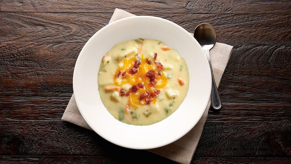 Irish Potato Soup (550/390 Cal) · Once a soup du jour, our creamy Irish Potato Soup has returned to our menu. Raise your spoon to potatoes, milk, sweet cream, sour cream, onions and carrots with a cheddar base in a savory chicken stock.