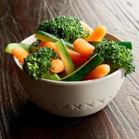 Steamed Veggies · Assortment of broccoli, carrots, & zucchini steamed. Serves 1.
