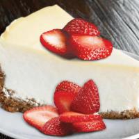 Strawberry-Topped Cheesecake  · Classic cheesecake topped with strawberries.