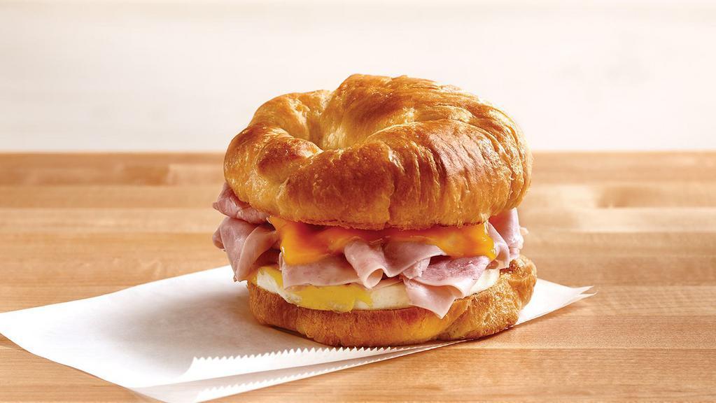 Sunshine Breakfast Croissant (510-720 Cal)  · Fresh-cracked egg, melted cheddar and your choice of breakfast sausage, crispy bacon or nitrite-free ham, on an all-butter croissant.