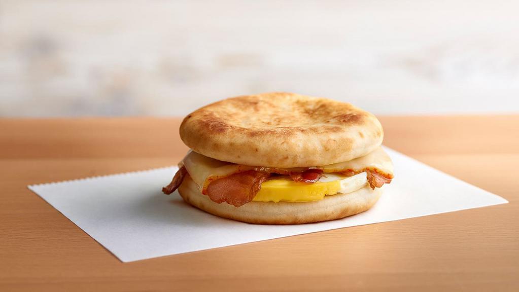 Breakfast Sammy (240-400 Cal)  · Flatbread sandwich featuring fresh-cracked egg, melted Muenster and your choice of breakfast sausage, crispy bacon, nitrite-free ham or meatless.