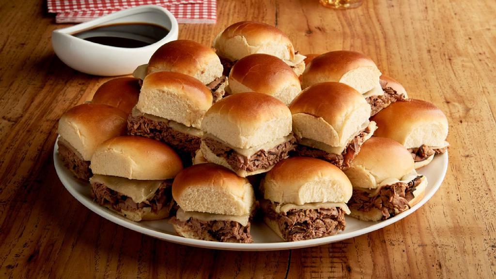 Beefeater Sliders Tray (4990 Cal) · Hot roast beef with provolone and mayo on tasty potato slider buns. Served with au jus on the side. Twenty-four tasty sliders. (Serves 12)