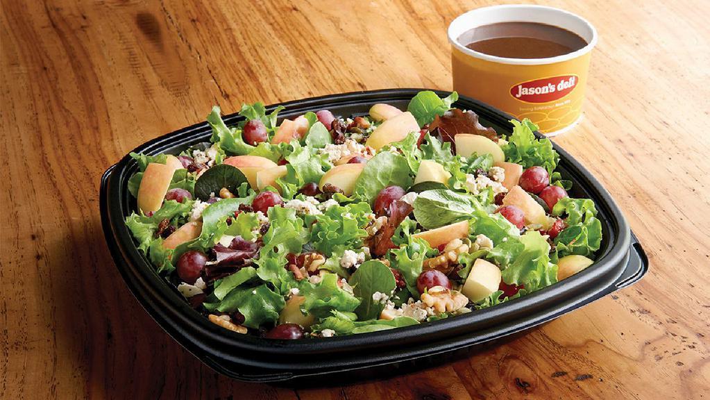 Family Nutty Mixed-Up Side Salad   · Organic field greens, grapes, feta, cranberry-walnut mix, organic apples, served with  your choice of dressing. (Serves 4)
