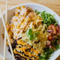 Chicken Enchilada Bowl · Shredded chicken, white rice, queso, corn salsa, lettuce, pico de gallo, and black beans top...