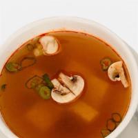 S01-Large-Tomyum Soup · Spicy and sour clear broth, galangal, lime leaf, lemongrass, mushroom, tomato and cilantro