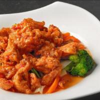 Thai World Chicken · Deep fried chicken breast tossed in homemade sweet chili sauce served with streamed mixed ve...