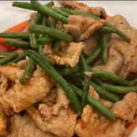 Pad Prik Khing Pork · Fried pork sauteed in red curry paste, kaffir lime leaves, long bean and bell peppers