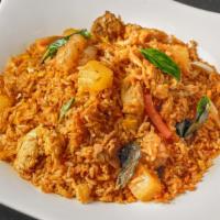 Spicy Fried Rice · Stir fried white rice, egg, white onions, scallions, Thai basil, pineapples, tomato with spe...