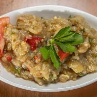 Eggplant Salad · Vegan. Charcoal grilled eggplant, green and red pepper flavored with garlic and herbs.
