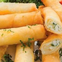 Turkish Cheese Rolls · Rolls with cheese is a type of pastry made with thin filo pastries filled with cheese.