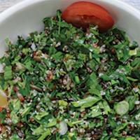 Tabouli Salad · Vegan, vegetarian. Finely chopped parsley, with tomatoes, mint, onion, quinoa, and seasoned ...